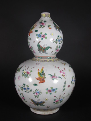 An Oriental double gourd shaped vase decorated butterflies and flowers, base with 6 character mark 16"