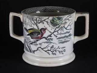 A 19th Century twin handled loving cup marked Health and Happiness decorated birds 5"