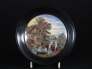 A 19th Century circular Prattware pot lid Fording The Stream contained in an ebonised socle frame 4"