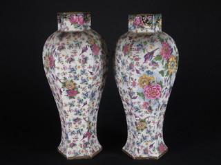 A pair of Warwick octagonal floral patterned vases 11"