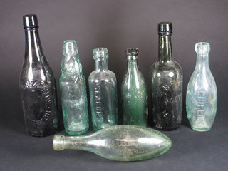 A torpedo shaped bottle marked F Chitty soda water and 6  other Victorian Sussex bottles