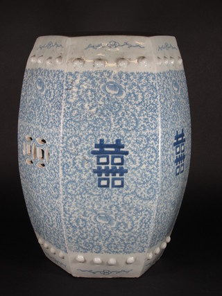 An Oriental blue and white octagonal barrel shaped garden seat  11"