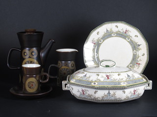A 15 piece Royal Doulton Mandarin patterned dinner service comprising oval twin handled tureen and cover - cracked, 8 side  plates 8" - cracked, 6 dinner plates 10" - 4 cracked and a 17  piece Denby Arabesque pattern coffee service with 2 plates 8"  and 8 1/2", coffee pot, 2 jugs 5" and 4", 6 coffee cups and 6  saucers