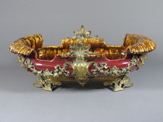 A 19th Century Majolica oval centre piece/planter with pierced  gilt metal mounts 20", f and r,