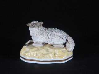 A 19th Century Staffordshire figure of a seated sheep 3", chipped  and cracked