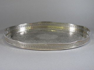 An oval galleried silver plated twin handled tea tray 24"