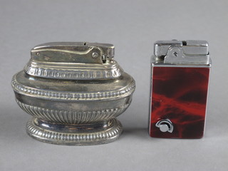 A Ronson Queen Anne style table lighter and a musical table  lighter