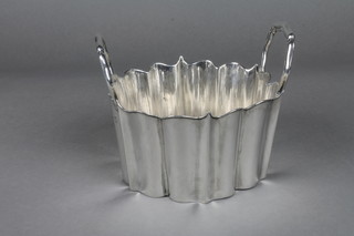 An Austrian silver twin handled pail with wavy border 9 ozs