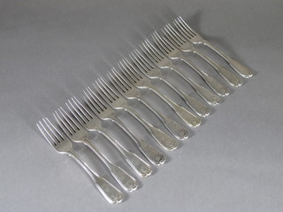 A set of 12 George III silver fiddle, thread and shell pattern pudding forks, London 1811, 21 1/2 ozs