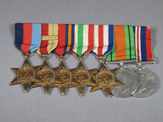 A group of 7 medals comprising 1939-45 Star, Africa Star with  bar North Africa 1942, Burma Star, Italy Star, France and  Germany Star, Defence and War medal
