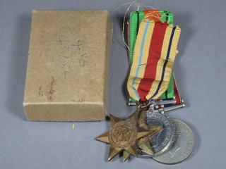 A group of 4 medals comprising Africa Star, Italy Star, Defence  and War medal