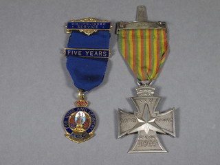 A Continental medal marked Star of Victory 1941 and a gilt  metal and enamelled medal marked King & Country