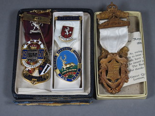 2 plastic 1945 Royal Masonic Institution for Girls jewels and 3  gilt metal and enamel jewels