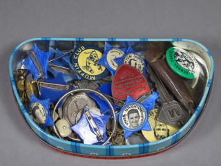 A collection of various badges