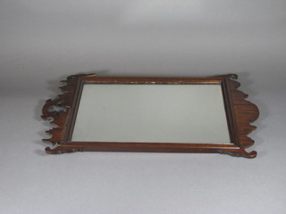 A 19th Century rectangular plate wall mirror contained in a mahogany frame 15"w x 25"h