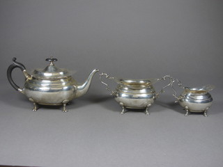 A Victorian oval silver 3 piece bachelor's tea service comprising teapot, twin handled sugar bowl and cream jug, Sheffield 1899,  17 ozs  ILLUSTRATED