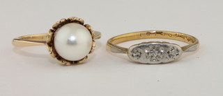 A gold dress ring set illusion set diamonds and a pearl dress ring