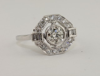 A lady's 18ct white gold cluster dress ring set a circular diamond surrounded by diamonds, approx 0.90ct