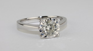A lady's 9ct white gold solitaire dress ring set a diamond approx  0.70ct
