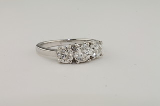 A lady's 18ct white gold dress ring set 3 diamonds, approx  1.75ct