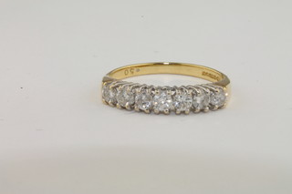 A lady's 18ct gold dress ring set 7 diamonds, approx 0.50ct