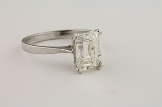 A lady's 18ct white gold dress ring set a baguette cut solitaire diamond, approx 2.07ct
