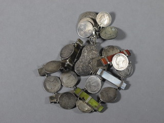 A bracelet formed from various silver thruppences