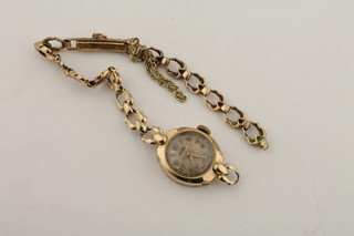 A lady's Rotary wristwatch contained in a gold case
