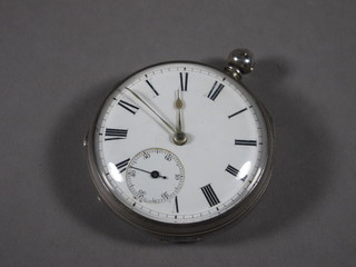 A Victorian open faced pocket watch contained in a silver case, Chester 1876, top ring missing,