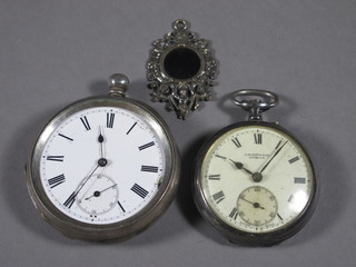 An open faced fob watch by J McDowell of Dublin contained in  a silver case together with an open faced pocket watch