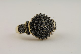 A 9ct gold cluster dress ring set black diamonds, approx 1ct