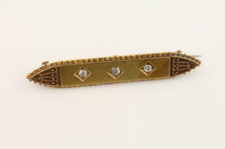 A 15ct gold bar brooch set 3 diamonds