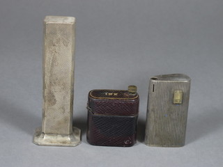 A Dunhill silver plated tallboy table lighter, a Ronson lighter and  a small leather inkwell