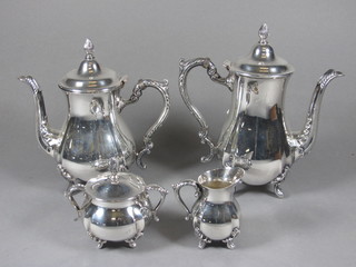A silver plated 4 piece tea/coffee service comprising teapot, hotwater jug, twin handled sugar bowl and cream jug