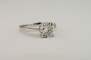 A lady's 9ct white gold solitaire dress ring set a diamond approx  0.70ct
