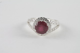 A silver dress ring set rubies and diamonds, approx 4ct
