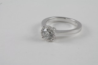 A lady's 18ct white gold dress ring set a solitaire diamond