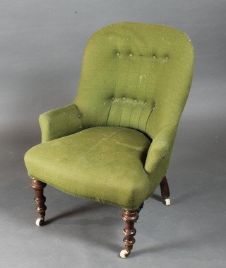 A Victorian metal framed chair upholstered in green material  with loose white cover