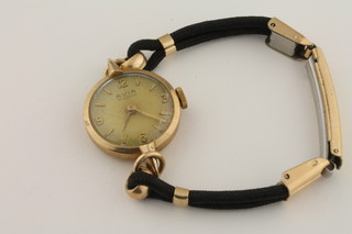 A lady's Avia wristwatch contained in a gold case