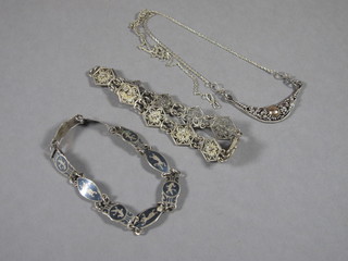 A silver and niello bracelet, a marcasite bracelet and a necklace