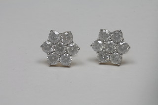 A pair of 18ct gold cluster earrings set diamonds, approx 4.61ct