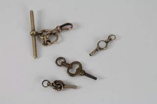 3 gilt metal watch keys and an 18ct gold T bar
