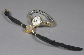 A lady's Omega wristwatch contained in a gold case and a lady's Avio wristwatch contained in a gold case