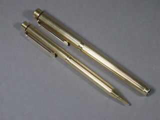 A gold plated Schaefer fountain pen and do. propelling pencil