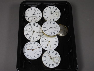 A collection of various pocket watch movements