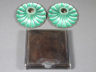 A pair of Danish green enamelled and Sterling silver stub shaped candlesticks 3" together with a leather and chrome cigarette case