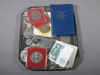 A set of 1977 British proof coins, a Franklin Mint 1983 calendar medallion, various crowns
