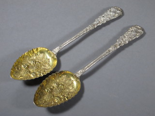 A pair of silver plated berry spoons