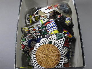 A collection of African bead work figures