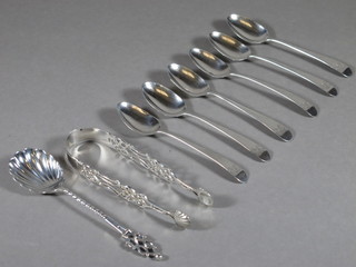 5 Georgian silver Old English pattern teaspoons, marks rubbed, a  pair of Georgian pierced silver sugar tongs and a Victorian shell  shaped spoon, London 1895 3 1/2 ozs